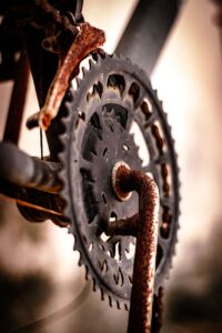 rusty crank and derailleur of an old bicycle