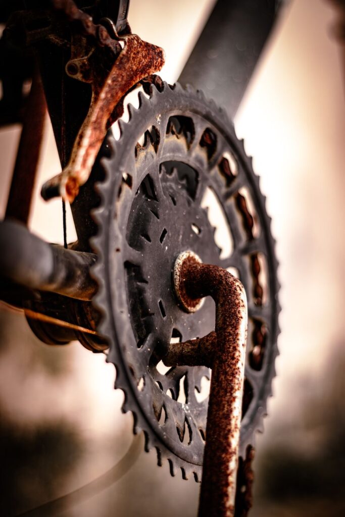rusty crank and derailleur of an old bicycle